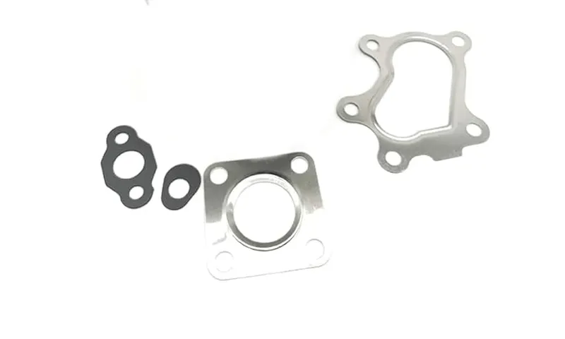 Empaquetadura Turbo AS12 IHI RHF4 NZ870564 New Holland Cat 247 Shibaura - Imagen 1