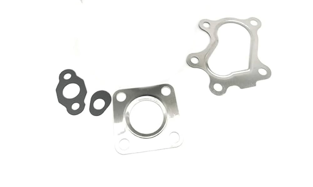 Empaquetadura Turbo AS12 IHI RHF4 NZ870564 New Holland Cat 247 Shibaura — E&E Turbo